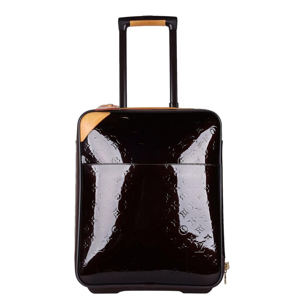 Louis Vuitton Pegase suitcase in black leather