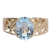 Oval Aquamarine Topaz Solitaire.10k Filigree ring