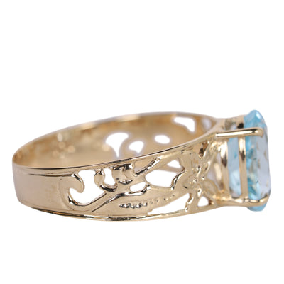 Oval Aquamarine Topaz Solitaire.10k Filigree ring