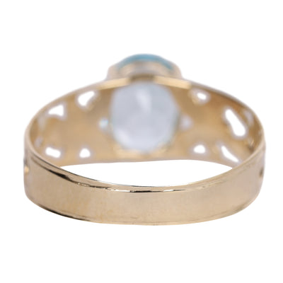 Oval Aquamarine Topaz Solitaire.10k Filigree ring