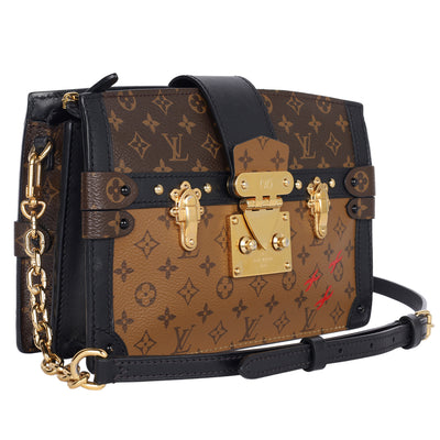 Reverse Monogram Trunk Clutch