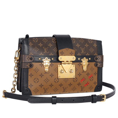 Reverse Monogram Trunk Clutch