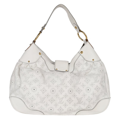 Perforated Monogram Mahina Leather Solar PM bag.