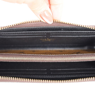 Monogram Reverse Coated Canvas Clemence Wallet