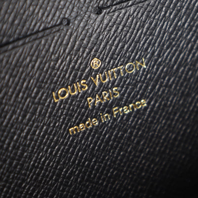 Monogram Reverse Coated Canvas Clemence Wallet