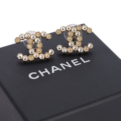 CC logo gold tone pink rhinestone stud pierced earrings