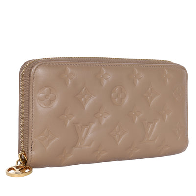 Lambskin Embossed Monogram Coussin Zippy Wallet Taupe