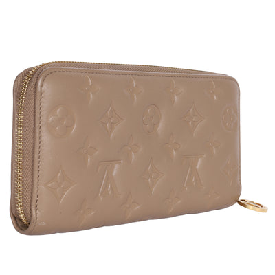 Lambskin Embossed Monogram Coussin Zippy Wallet Taupe