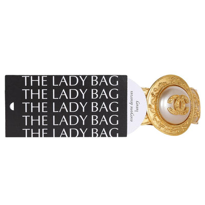 Vintage Chanel Gold Faux Pearl Textured Metal CC Logo Bracelet (Authen –  The Lady Bag